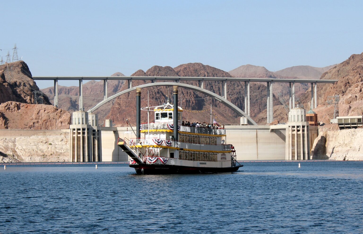 Lake Mead Cruises Desert Princess in front of Hover Dam